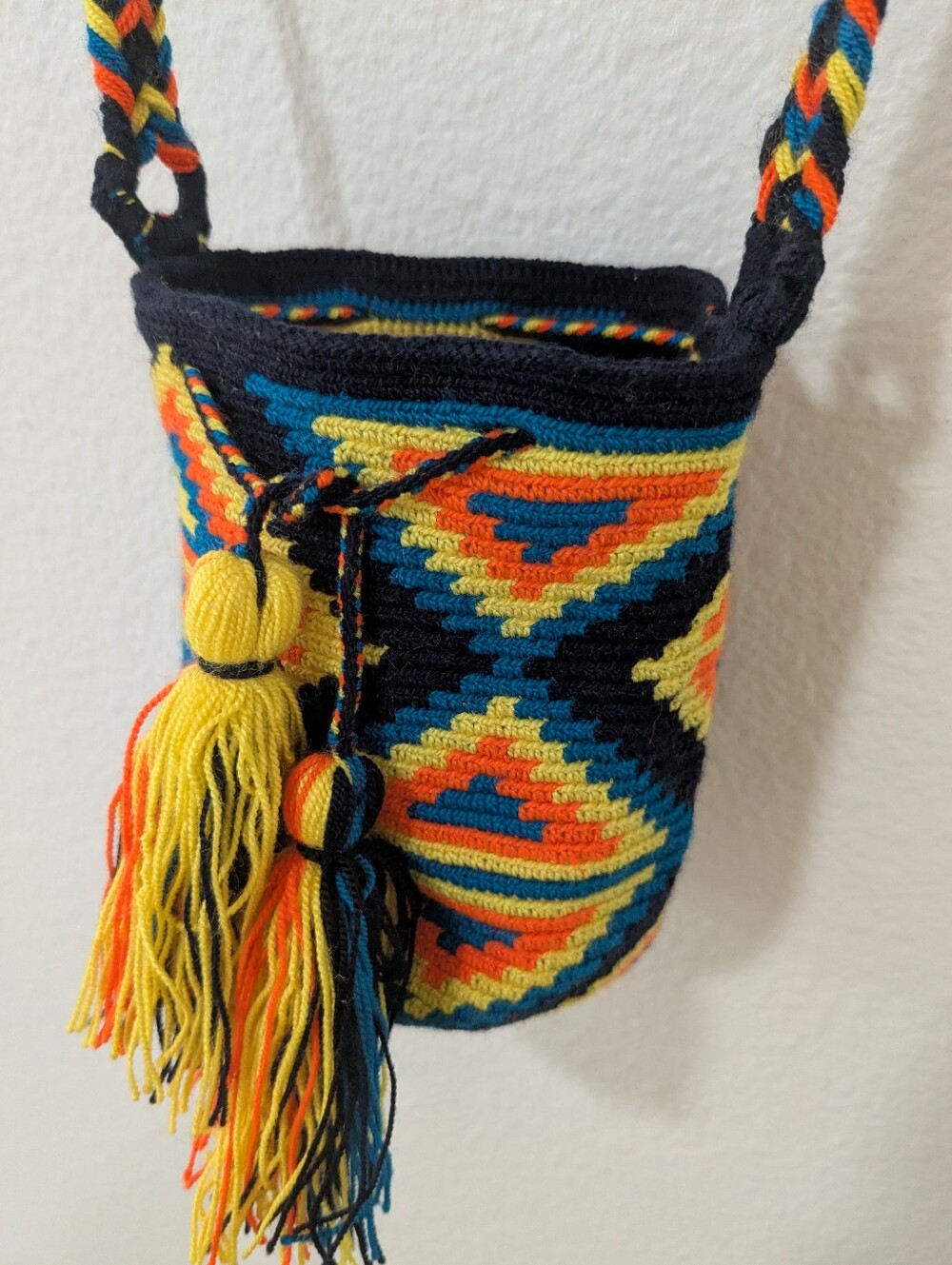 Small crochet bucket bag, black orange yellow teal